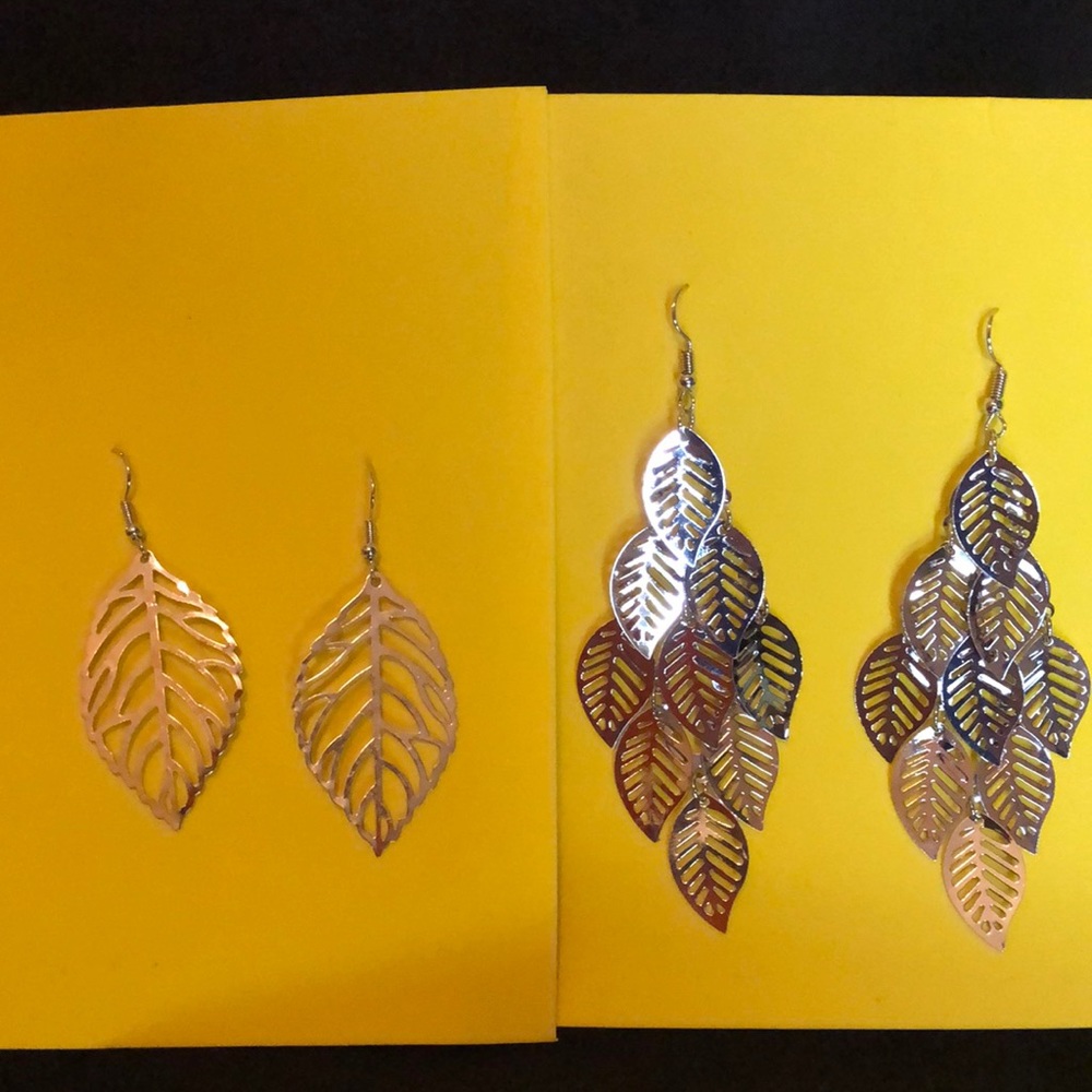 Silver toned earrings.  Light weight. NWOT. 2pairs